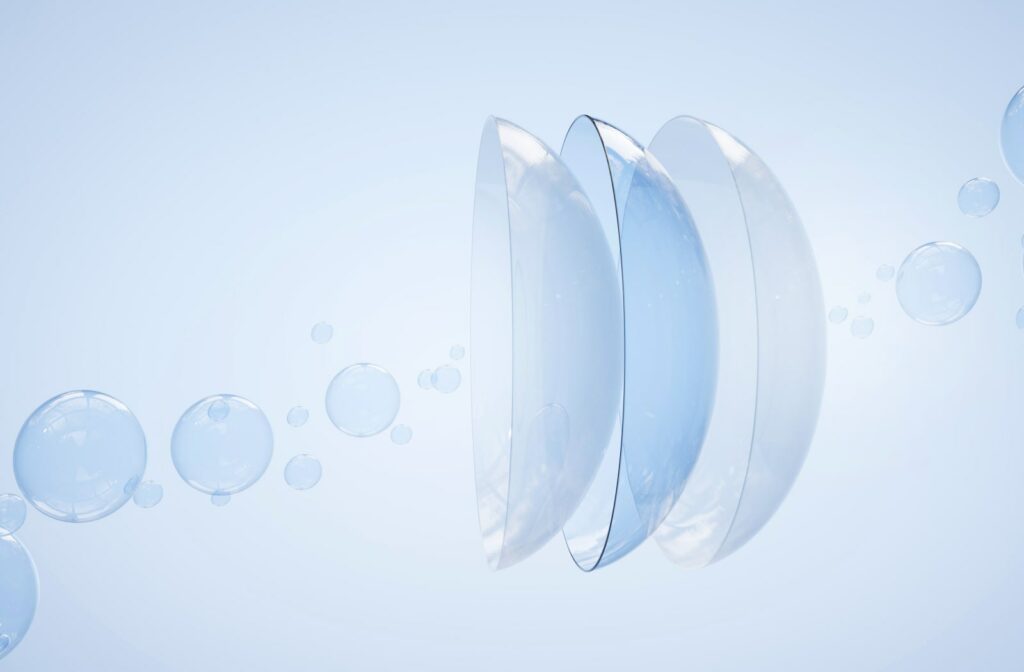 Close-up view of contact lenses floating, a 3D illustration.