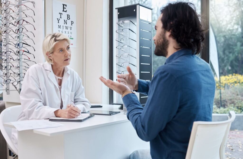 a patient discusses payment options with their optometrist