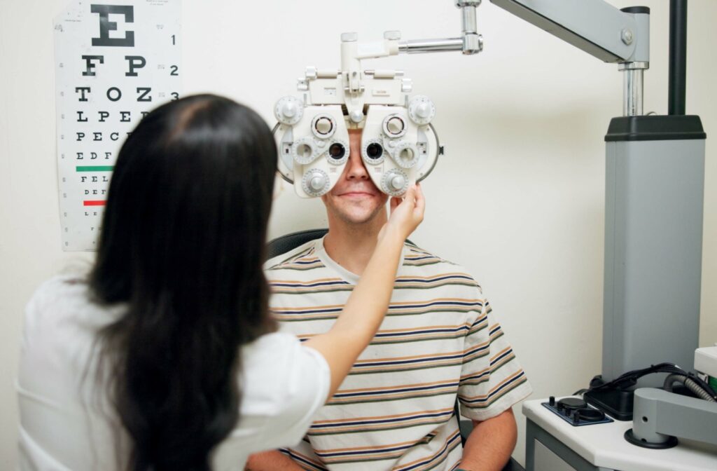 Patient receiving an eye exam from an optometrist.